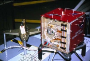 The ITAMSAT Packet Radio satellite that later became ITALY OSCAR 26 on orbit. Note the highly advanced ejection system (consisting of a simple hardware-store spring!) on the mounting platform.